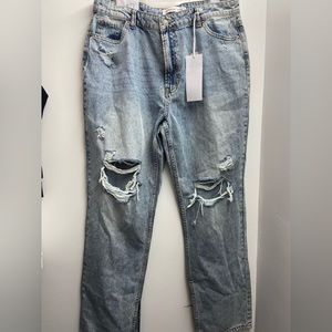 Super high rise straight leg jeans with slit hem